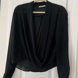 Sheer black blouse